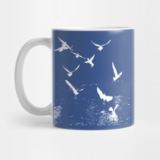 White Silhouette Of A Flock Of Seagulls Scavenging Mug